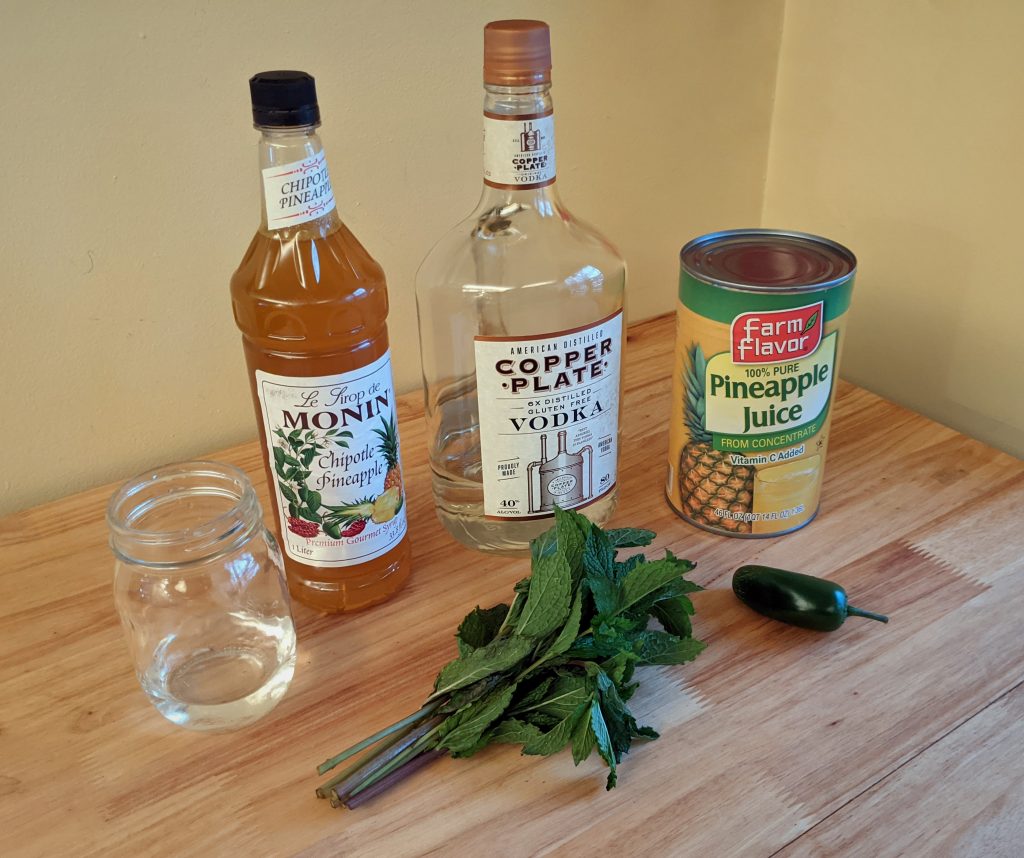 Ingredients to make Carnival's Spicy Chipotle Pineapple Martini