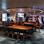 Casino with slots and tables on the Carnival Breeze