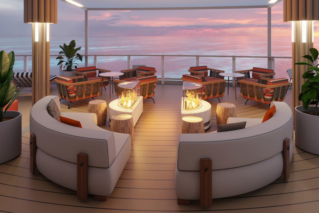 Fire pit with couches on a cruise ship deck with ocean in background