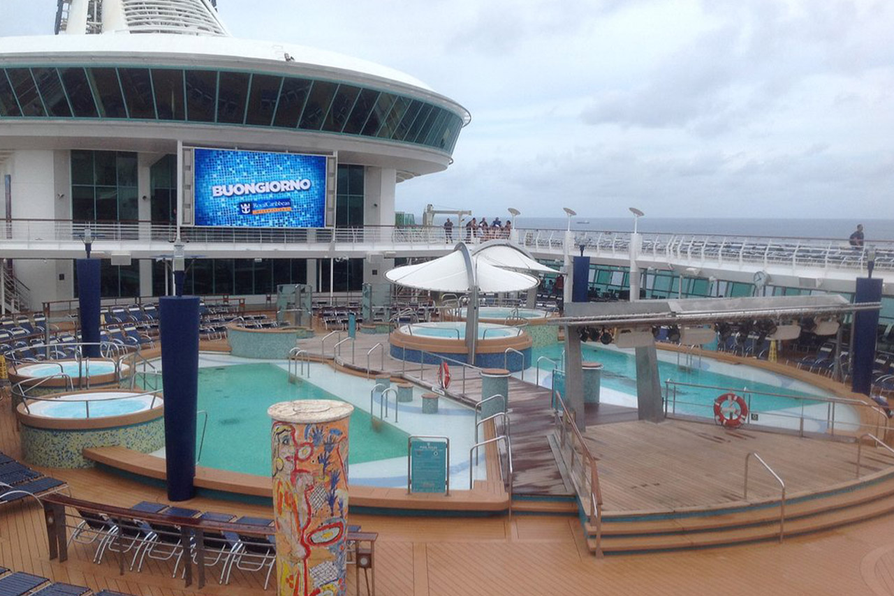 The main pools, hot tubs, and giant movie screen on Royal Caribbeans Adventure of the Seas