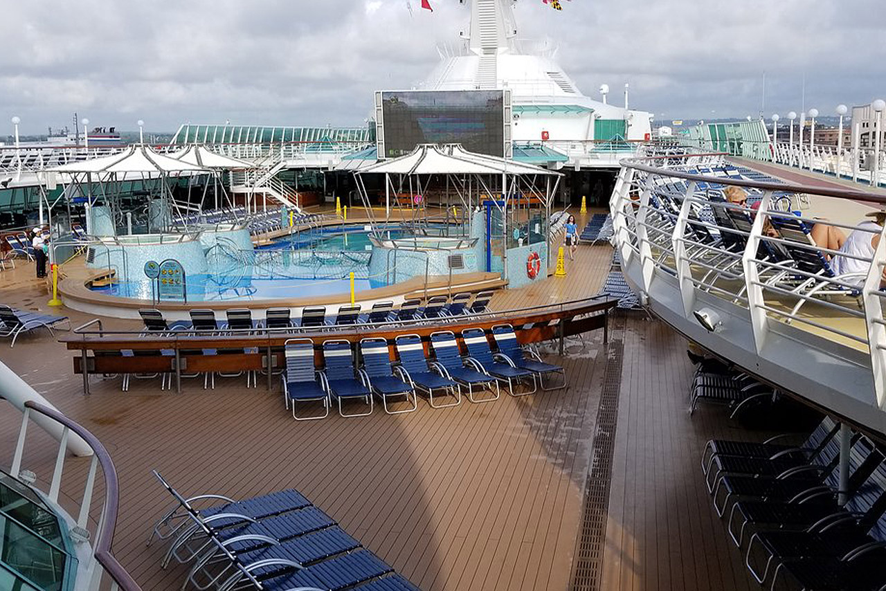The main pool, 4 hot tubs and giant movie screen on Royal Caribbeans Grandeur of the Seas