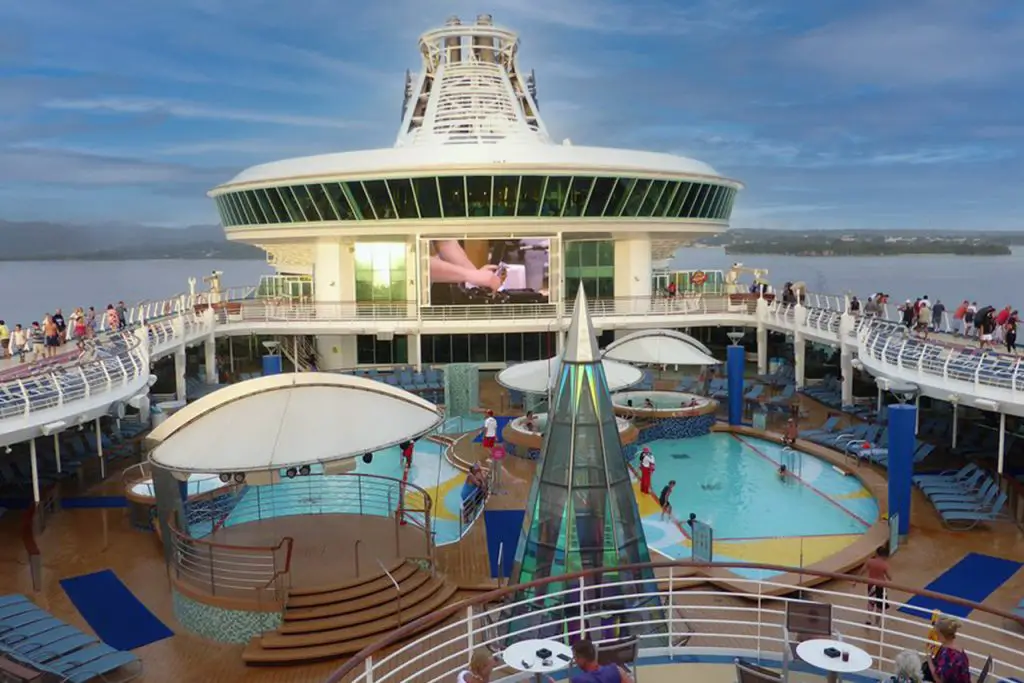 The main pools, 2 hot tubs, and giant movie screen on Royal Caribbean