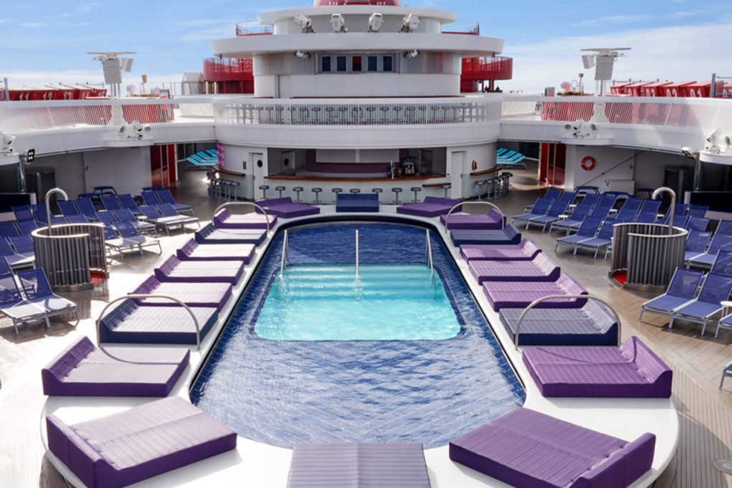 The main pool on the Virgin Voyages Valiant Lady