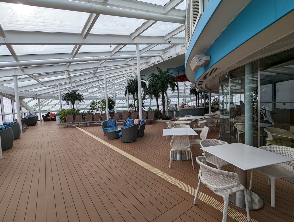 ovation of the seas solarium on a rainy day