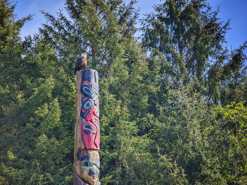 totem pole with bald eagle on top