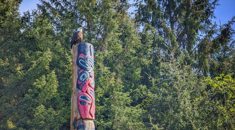totem pole with bald eagle on top
