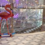 two pink flamingo statues in the 820 biscayne zone on carnival celebration