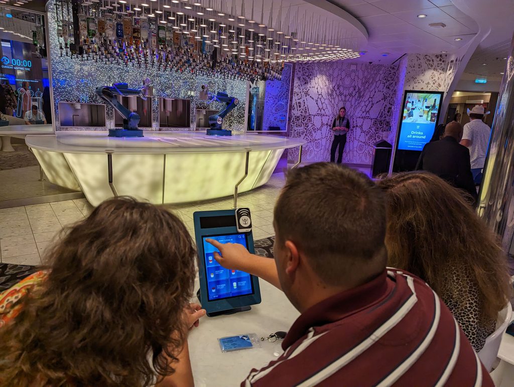 ordering on tablet at bionic bar on harmony of the seas