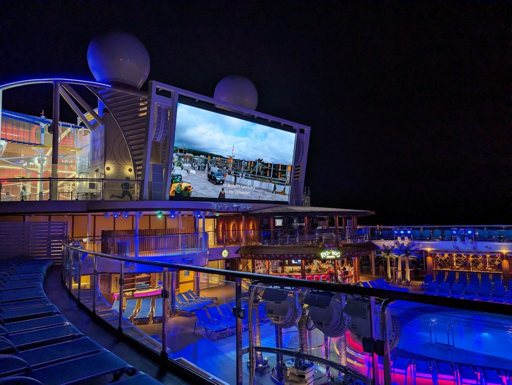 carnival celebration pool deck at night