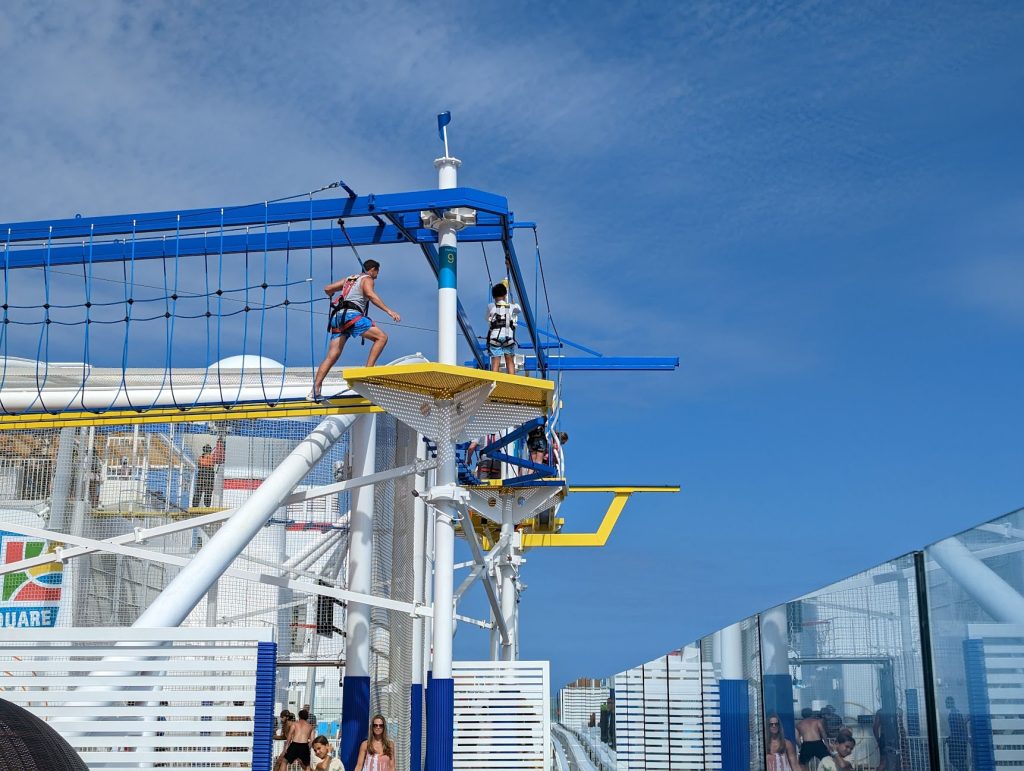 plank on the ropes course on a cruise ship.