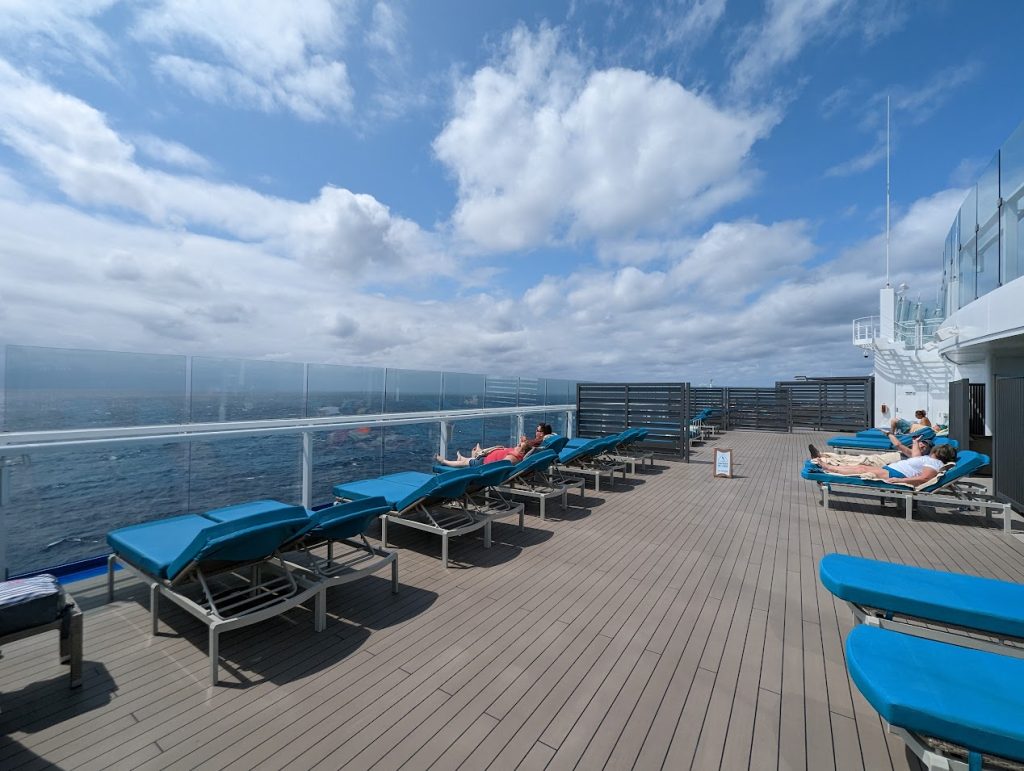 carnival celebration loungers looking at the ocean