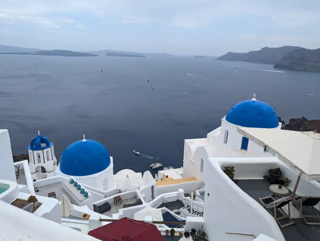 blue domed church in oia