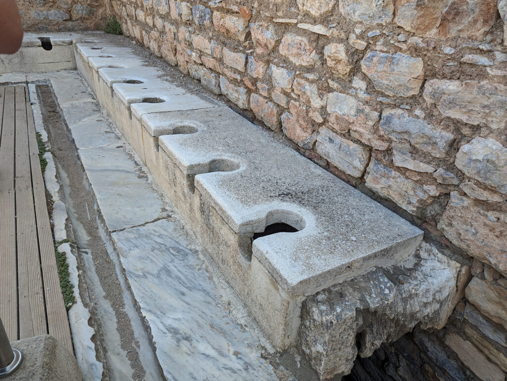 ancient public toilet in ephesus