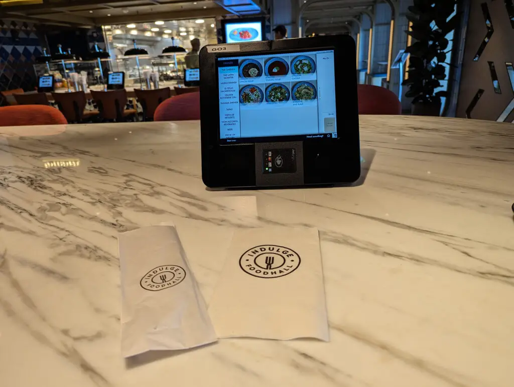 indulge food hall tablet and napkins on norwegian viva