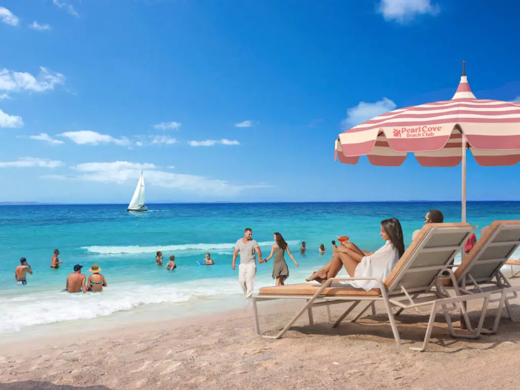 pearl cove beach club umbrella on beach