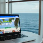 royal caribbean cruise planner on laptop