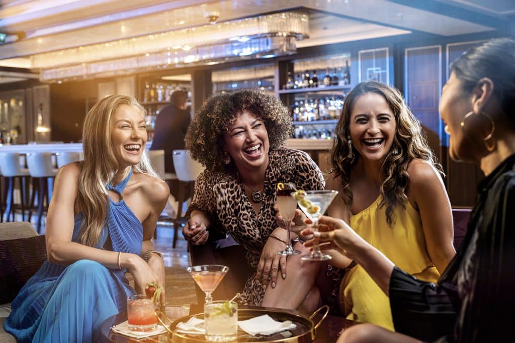 women at a bar on a cruise ship
