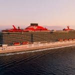 virgin voyages ship with blue extras logo