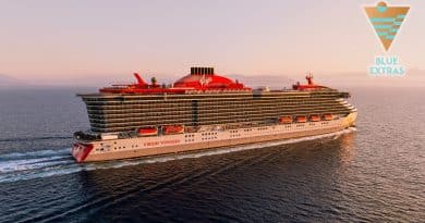 virgin voyages ship with blue extras logo