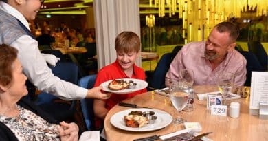 family at main dining room on carnival ship