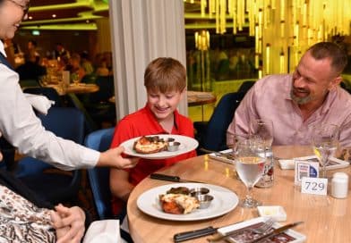 family at main dining room on carnival ship