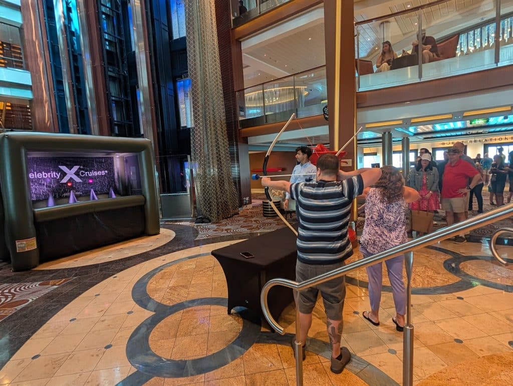 archery setup in grand foyer of Celebrity Reflection