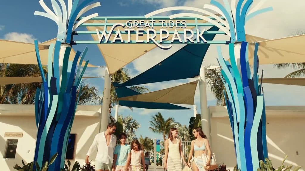 great tides waterpark sign with family
