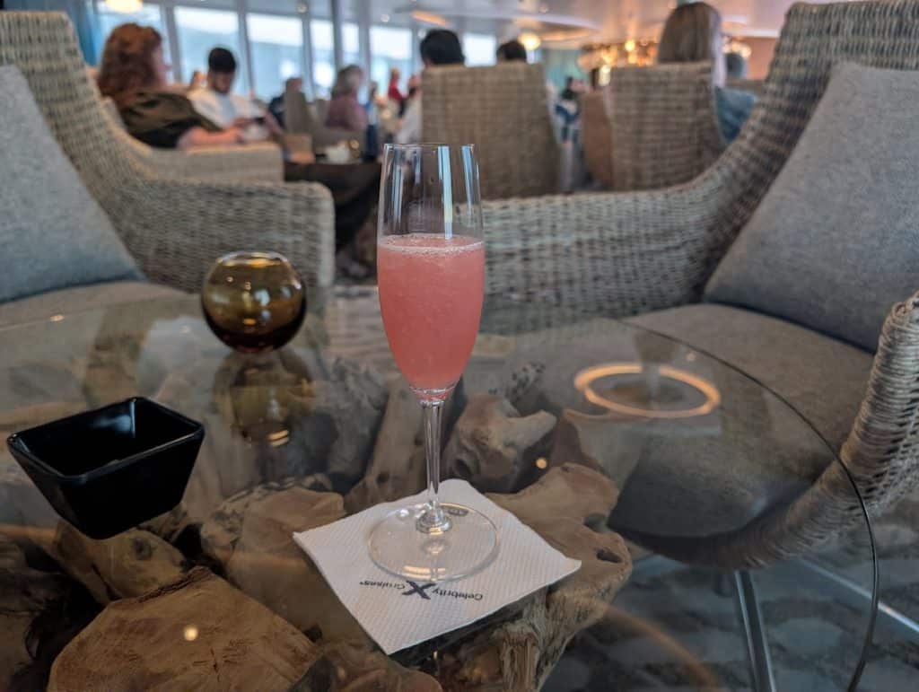 pink flamingo cocktail on table in lounge
